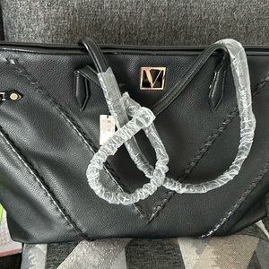 Black ladies tote bag never used